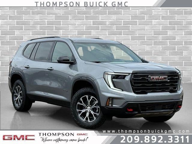 2026 GMC Acadia AT4 in Sterling Metallic — front three-quarter view