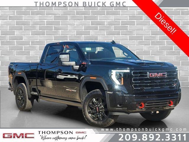 2026 GMC Sierra 2500 HD AT4 in Onyx Black — front three-quarter view