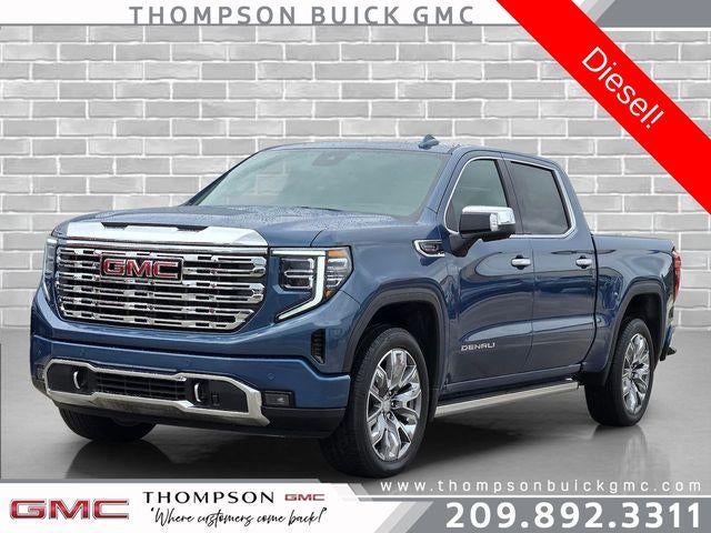 2026 GMC Sierra 1500 Denali in Downpour Metallic — front three-quarter view