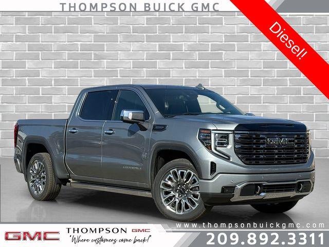 2026 GMC Sierra 1500 Denali Ultimate in Sterling Metallic — front three-quarter view