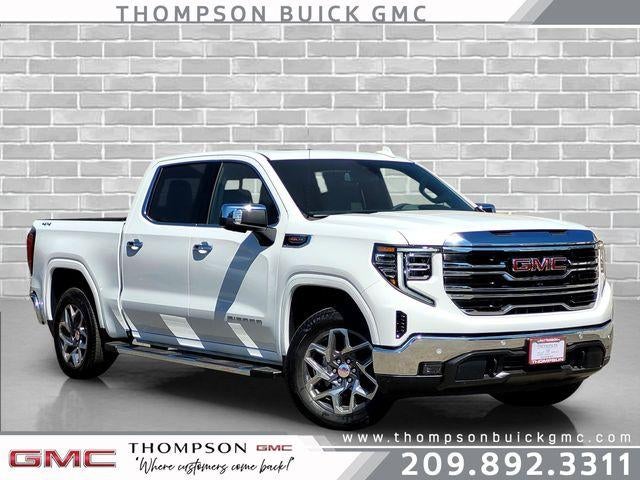 2026 GMC Sierra 1500 SLT in Summit White — front three-quarter view
