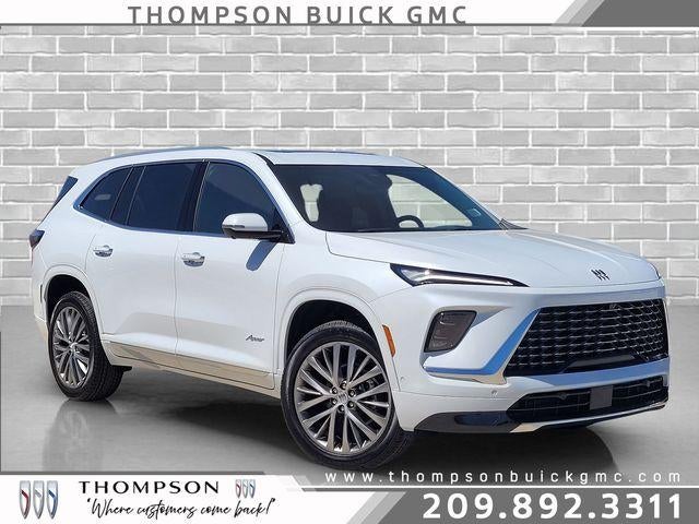 2026 Buick Enclave Avenir in Iridescent White Tricoat — front three-quarter view