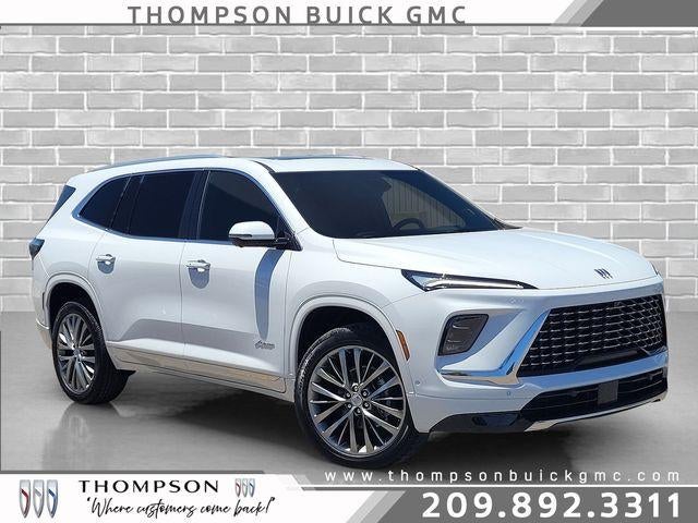 2026 Buick Enclave Avenir in Iridescent White Tricoat — front three-quarter view
